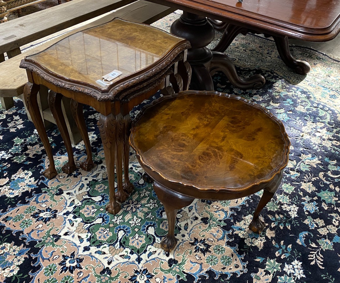 A Queen Anne revival nest of three walnut tea tables, width 58cm, depth 44cm, height 58cm together with a similar circular walnut coffee table